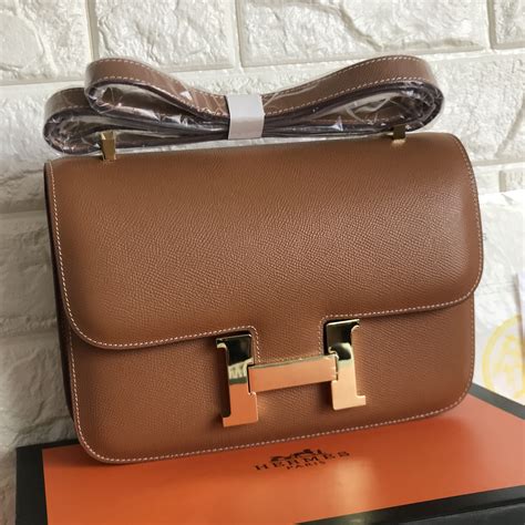 brown hermes crossbody bag mini|hermes sling bag price.